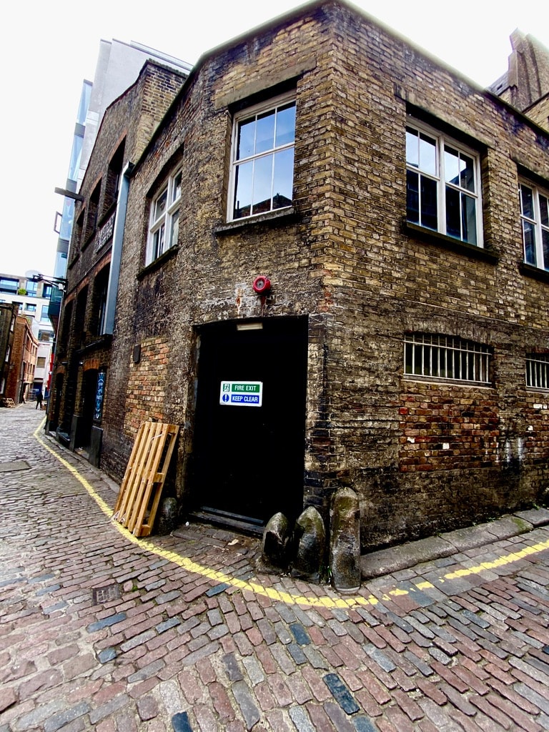 Historic cobbled alleyway in Fitzrovia