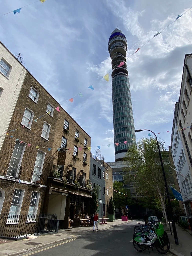 Fitzrovia street with bunting and BT Tower
